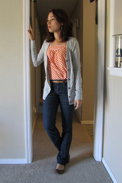 orange shirt with blue jeans