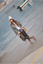 Zara shorts - Bimba&Lola boots - Dayaday bag