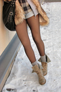 Beige-shirt-gray-blue-shorts-beige-vest-black-beige-boots